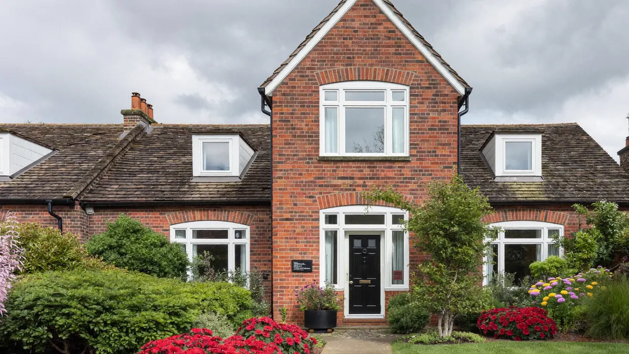 Low-E glazed replacement windows fitted to a period brick home